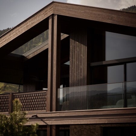 Surrounded by weathered stone, dark timber and flowing mountain ...